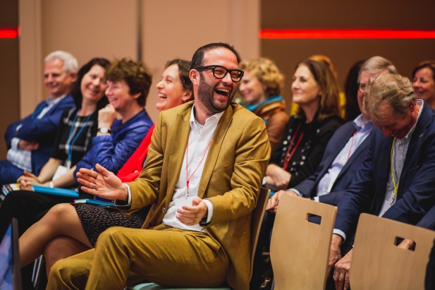 publiek bij presentatie over high performance leiderschap