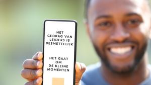 mobiele telefoon met teksts gedrag van leiders is besmettelijk